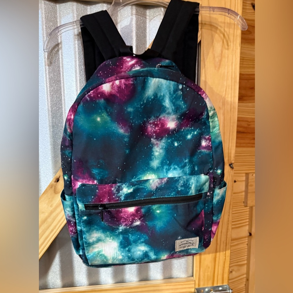 Hot Style Backpack with Galaxy photo fabric. Multiple pockets. Large